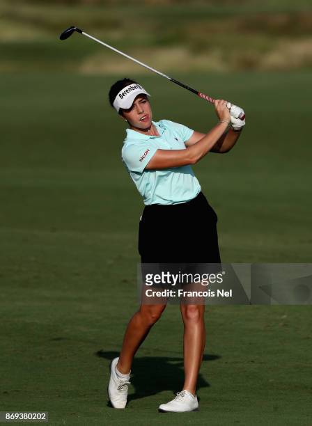 Georgia Hall of England plays her second shot on the 15th hole during Day Two of the Fatima Bint Mubarak Ladies Open at Saadiyat Beach Golf Club on...