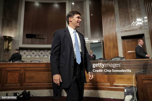 Mark Esper prepares to testify before the Senate Armed Services Committee during his confirmation hearing to be secretary of the U.S. Army in the...