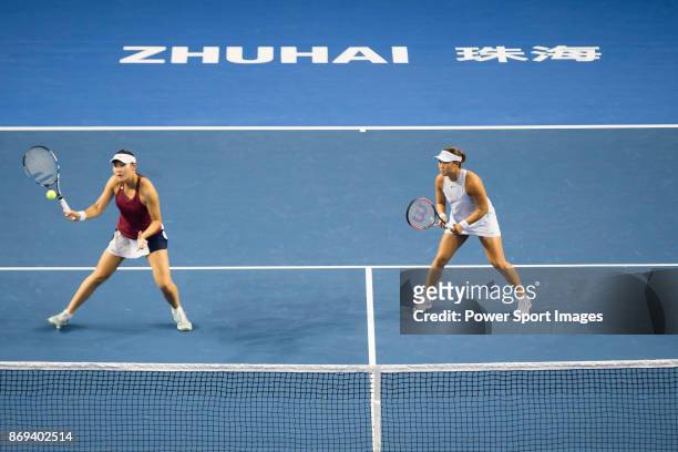 Ying-Ying Duan and Xinyun Han of China in action during the doubles Round Robin match of the WTA Elite Trophy Zhuhai 2017 against Raluca Olaru of...