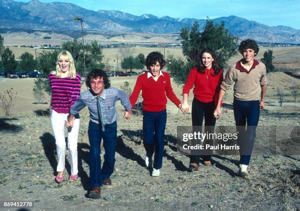 Actors Alison Arngrim, unknown, Jonathan Gilbert, Rad Daly and Melissa Gilbert at a press photo call, Malibu, California, 12th August 1980.