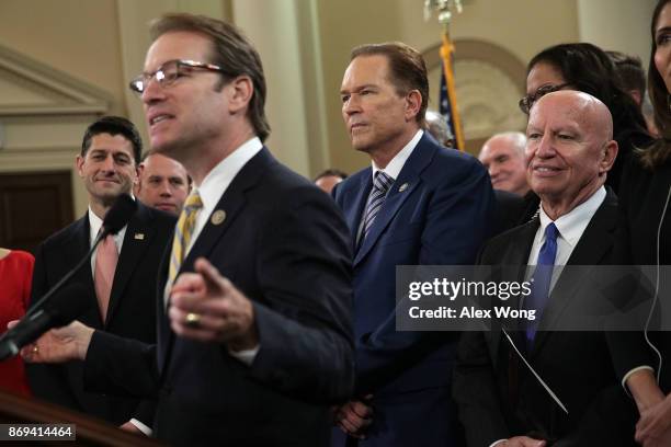 Rep. Peter Roskam speaks as Speaker of the House Rep. Paul Ryan , Rep. Vern Buchanan , and Chairman of House Ways and Means Committee Rep. Kevin...