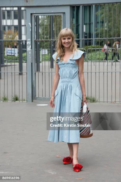 Danish actress Klara Kristin wears a Carven dress, bag and shoes day 3 of Paris Womens Fashion Week Spring/Summer 2018, on September 28, 2017 in...