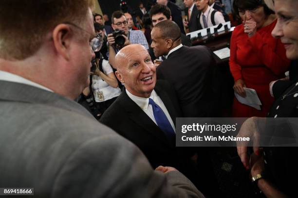 House Ways and Means Chairman Kevin Brady greets families who took part in the introduction of the House Republican tax reform legislation November...