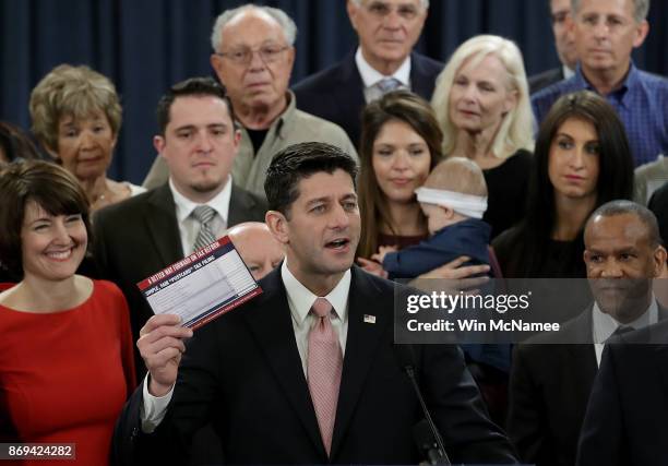 Speaker of the House Paul Ryan , surrounded by American families, and members of the House Republican leadership introduce tax reform legislation...