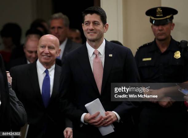Speaker of the House Paul Ryan and House Way and Means Chairman Kevin Brady arrive for the introduction of tax reform legislation November 2, 2017 in...