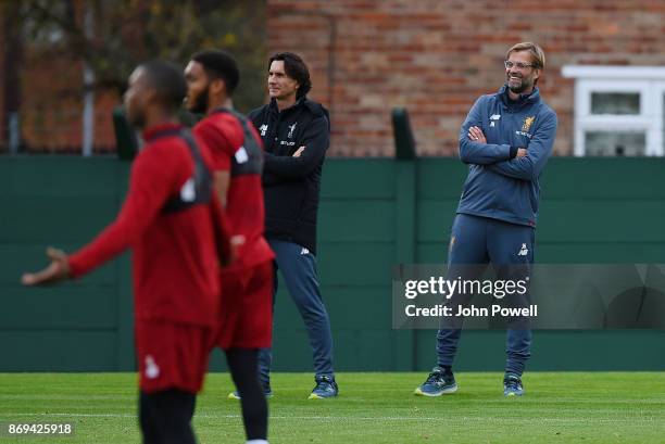 Jurgen Klopp manager and Zeljko Buvac of Liverpool during a training session at Melwood Training Ground on November 2, 2017 in Liverpool, England.