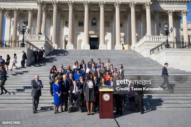 House Minority Leader Nancy Pelosi speaks at a press conference to show solidarity with the people of Puerto Rico and U.S. Virgin Islands after the...