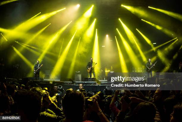 Molotov performs during a show as part of the AMPLIFICA concert in benefit of the September 19th earthquake victims at Palacio de los Deportes on...