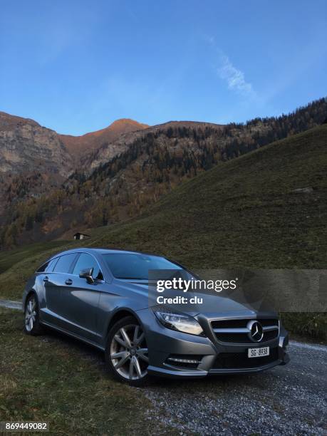 mercedes-benz c-klasse parked on a on rural road - mercedes benz stock pictures, royalty-free photos & images