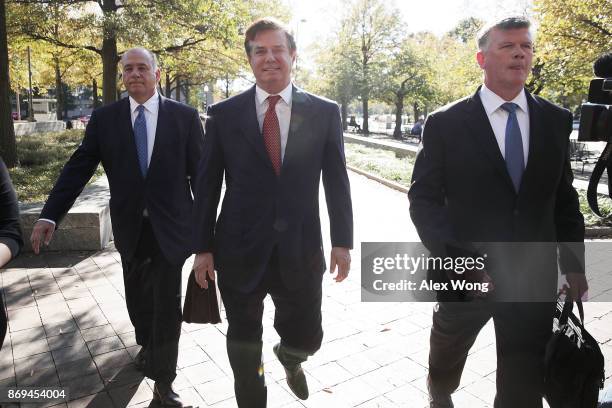 Former Trump campaign chairman Paul Manafort arrives at a federal courthouse with his attorney Kevin Downing November 2, 2017 in Washington, DC....
