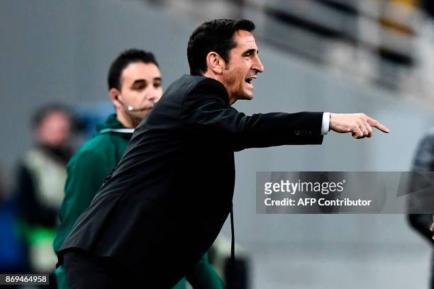 S Spanish coach Manolo Jimenez reacts during the UEFA Europa League Group D football match between AEK Athens and AC Milan at the OAKA stadium in...