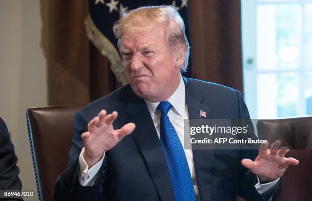 President Donald Trump speaks as he meets with House Republican leaders and Republican members of the House Ways and Means Committee at the White...