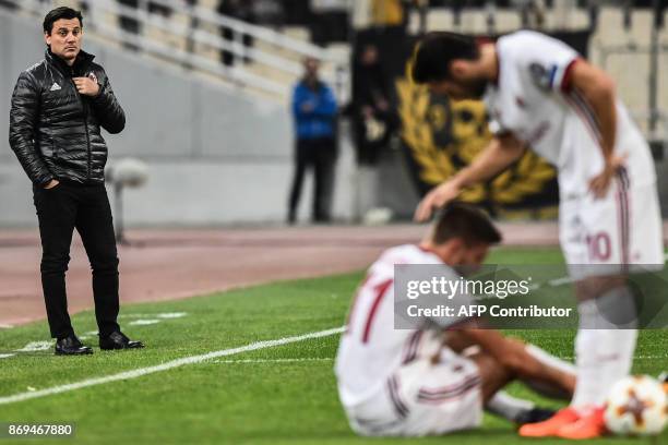 Milan's coach Vincenzo Montella looks on during the UEFA Europa League Group D football match between AEK Athens and AC Milan at the OAKA stadium in...