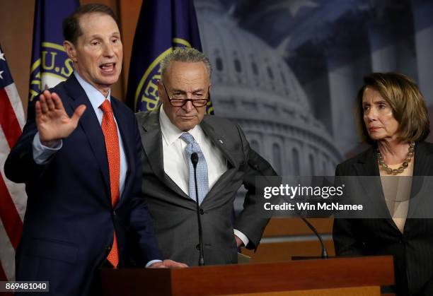 Sen. Ron Wyden speaks during a press conference where congressional Democrats reacted to the newly introduced Republican tax reform proposal November...