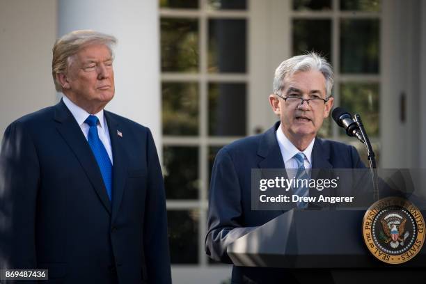 President Donald Trump looks on as his nominee for the chairman of the Federal Reserve Jerome Powell speaks during a press event in the Rose Garden...