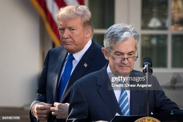 President Donald Trump looks on as his nominee for the chairman of the Federal Reserve Jerome Powell takes to the podium during a press event in the...