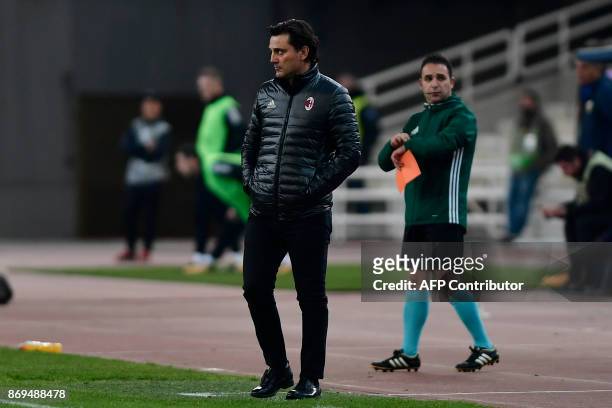 Milan's coach Vincenzo Montella looks on during the UEFA Europa League Group D football match between AEK Athens and AC Milan at the OAKA stadium in...
