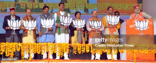 Candidates Pawan Nayyar from Chamba assembly segment, DS Thakur , Hans Raj , Rakesh Pathania , Rita Dhiman and Kripal Parmar waves at the crowd as...