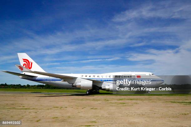 The Air China Boeing 747 carrying Chinese President Xi Jinping arrives at Hamburg Airport for the Hamburg G20 economic summit on July 6, 2017 in...