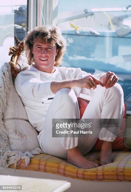 Andy Gibb sits in Victoria Principals Malibu home , he later committed suicide IN 1988 February 3, 1982 Malibu, California