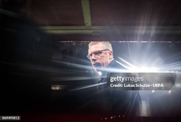 Head Coach Peter Stoeger of Koeln looks up prior to the UEFA Europa League group H match between 1. FC Koeln and BATE Borisov at RheinEnergieStadion...