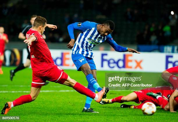 Hertha Berlin's Ivorian midfielder Salomon Kalou and Zorya's defender Artem Sukhotskiy vie for the ball during the UEFA Europa League football match...