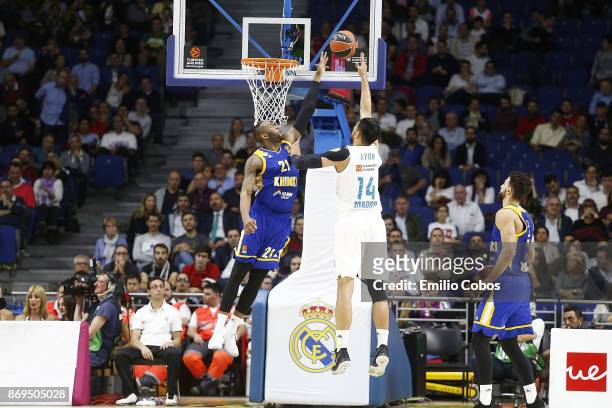 James Anderson, #21 of Khimki Moscow Region competes with Gustavo Ayon, #14 of Real Madrid during the 2017/2018 Turkish Airlines EuroLeague Regular...