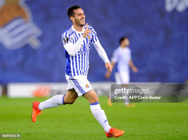 Real Sociedad's Spanish midfielder Juanmi celebrates after scoring a goal during the Europa League group L football match Real Sociedad vs FK Vardar...