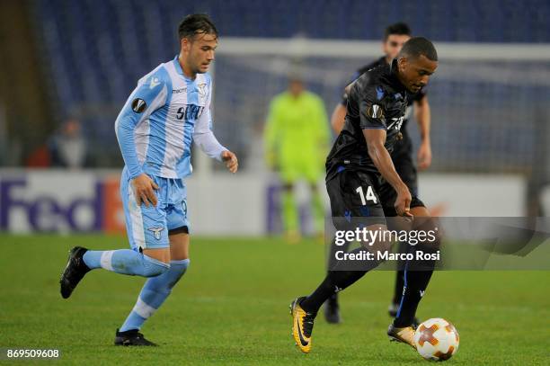 Luiz Alessandro Murgia of SS Lazio compete for the ball with Alassane Plea of OGC Nice during the UEFA Europa League group K match between Lazio Roma...