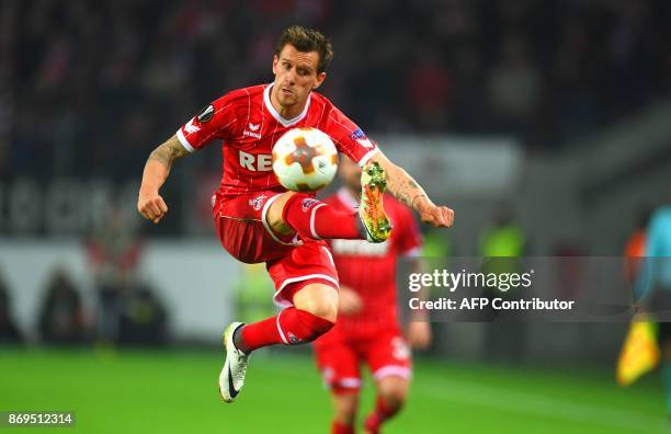 Cologne's German striker Simon Zoller plays the ball during the UEFA Europa League football match between FC BATE Borisov and FC Cologne on November...