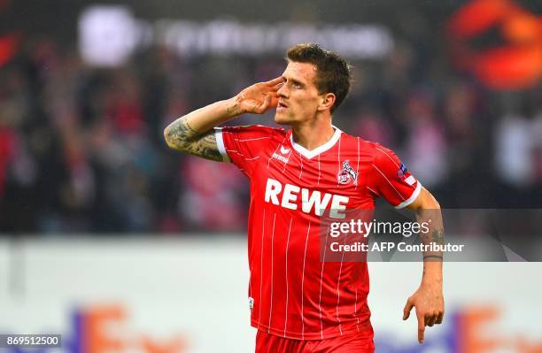 Cologne's Russian defender Konstantin Rausch celebrates scoring during the UEFA Europa League football match between FC BATE Borisov and FC Cologne...