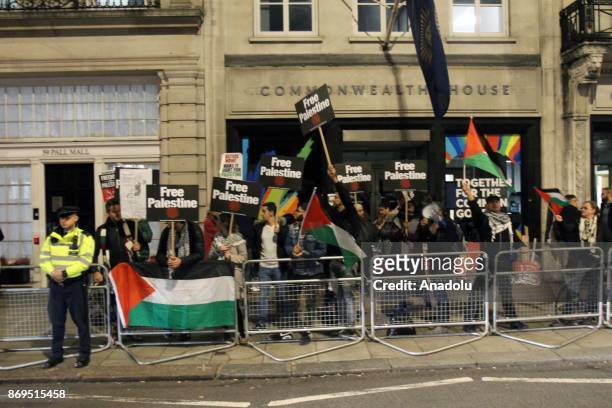 People stage a protest against the 100th anniversary of the Balfour Declaration in front of the Lancaster House in London, United Kingdom November 2,...