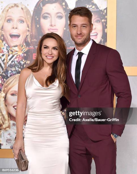 Actors Chrishell Stause and Justin Hartley arrive at the Los Angeles premiere of 'A Bad Moms Christmas' at Regency Village Theatre on October 30,...