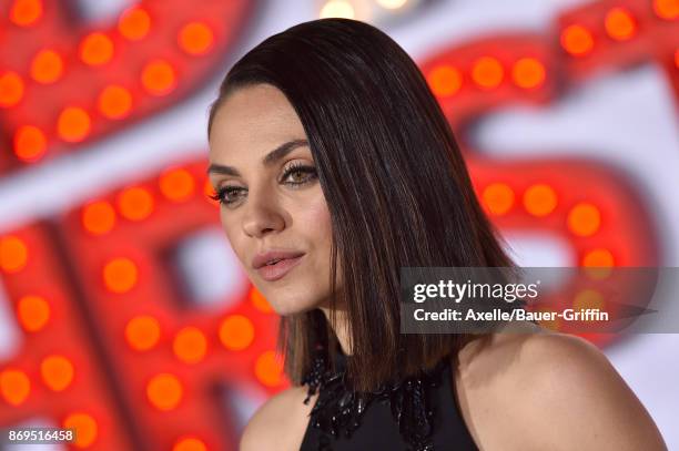 Actress Mila Kunis arrives at the Los Angeles premiere of 'A Bad Moms Christmas' at Regency Village Theatre on October 30, 2017 in Westwood,...