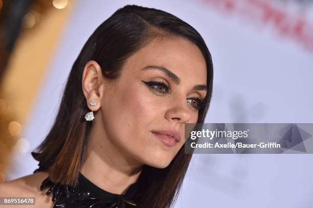 Actress Mila Kunis arrives at the Los Angeles premiere of 'A Bad Moms Christmas' at Regency Village Theatre on October 30, 2017 in Westwood,...