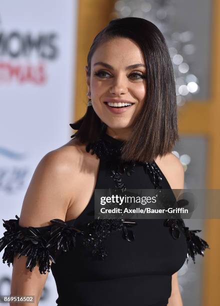 Actress Mila Kunis arrives at the Los Angeles premiere of 'A Bad Moms Christmas' at Regency Village Theatre on October 30, 2017 in Westwood,...