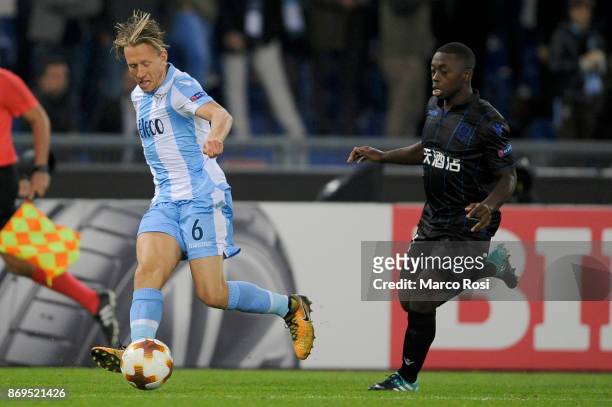Lucas Leiva of SS Lazio compete for the ball with Namplalys Mendy of OGC Nice during the UEFA Europa League group K match between Lazio Roma and OGC...