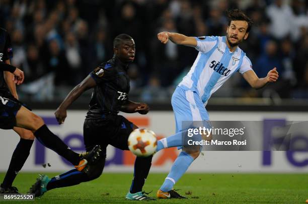 Marco Parolo Murgia of SS Lazio compete for the ball with Alassane Plea of OGC Nice during the UEFA Europa League group K match between Lazio Roma...