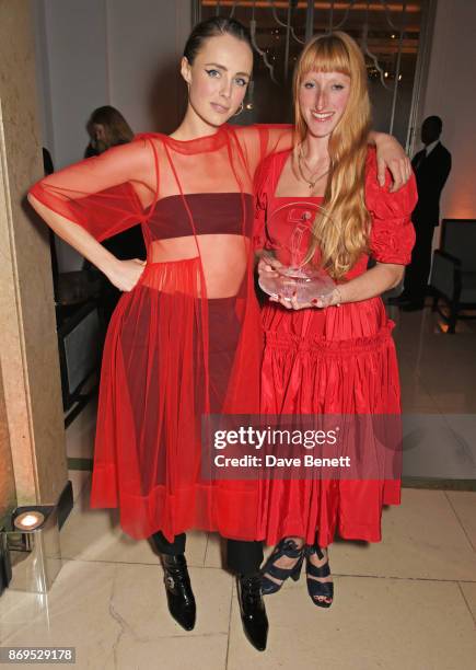 Edie Campbell and Molly Goddard, winner of the Breakthrough Designer Award, attend Harper's Bazaar Women of the Year Awards in association with Ralph...