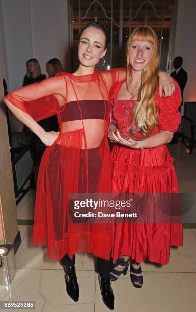 Edie Campbell and Molly Goddard, winner of the Breakthrough Designer Award, attend Harper's Bazaar Women of the Year Awards in association with Ralph...