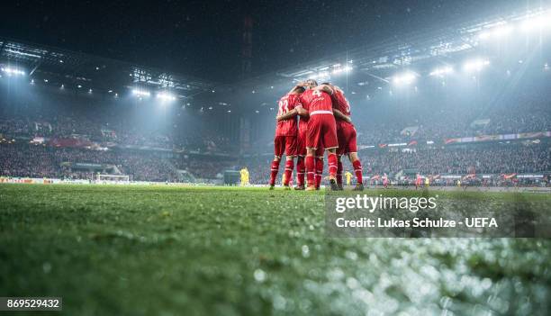 Milos Jojic of Koeln celebrates his teams fifth goal with team mates during the UEFA Europa League group H match between 1. FC Koeln and BATE Borisov...