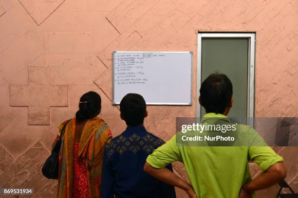 Relatives of victims of NTPC boiler explode ,looks on display chart ,in SGPGI,Lucknow , on November 2 ,2017. 26 people were killed and more than 100...