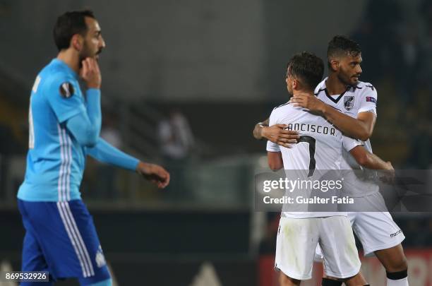 Vitoria Guimaraes player celebrate the victory at the end of the UEFA Europa League match between Vitoria de Guimaraes and Olympique Marseille at...