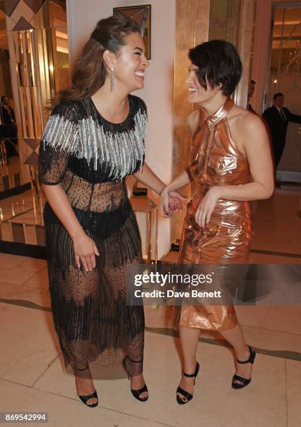 Ashley Graham, winner of the Model of the Year award, and Gemma Arterton attend Harper's Bazaar Women of the Year Awards in association with Ralph &...