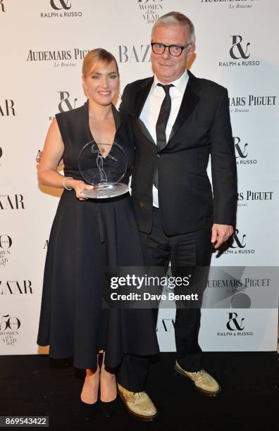 Kate Winslet, winner of the British Actress of the Year award, and Stephen Daldry attend Harper's Bazaar Women of the Year Awards in association with...