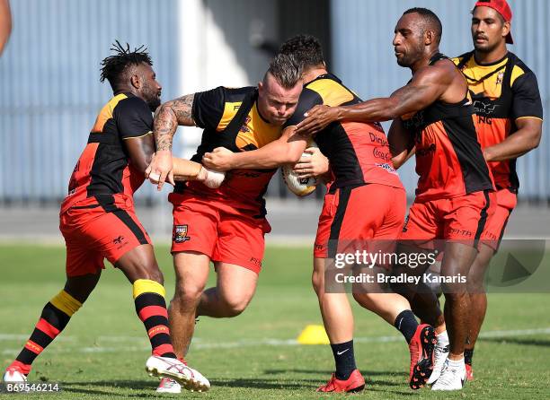 Luke Page takes on the defence during a Papua New Guinea Kumuls Rugby League World Cup training session at the Oil Search National Football Stadium...