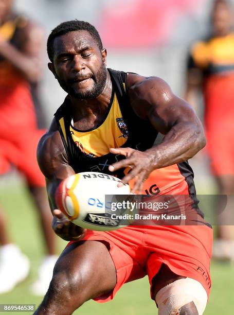 Ase Boas passes the ball during a Papua New Guinea Kumuls Rugby League World Cup training session at the Oil Search National Football Stadium on...