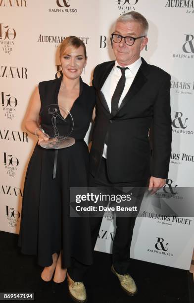 Kate Winslet, winner of the British Actress of the Year award, and Stephen Daldry attend Harper's Bazaar Women of the Year Awards in association with...