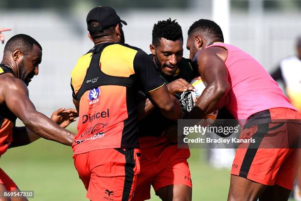 Nixon Put takes on the defence during a Papua New Guinea Kumuls Rugby League World Cup training session at the Oil Search National Football Stadium...