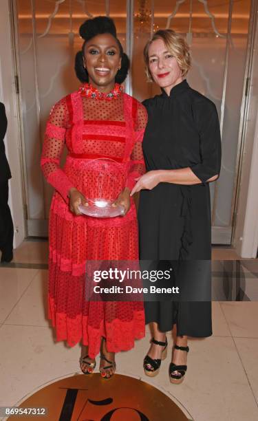 Chimamanda Ngozi Adichie, winner of the Writer of the Year award, and Sarah Chalfant attend Harper's Bazaar Women of the Year Awards in association...